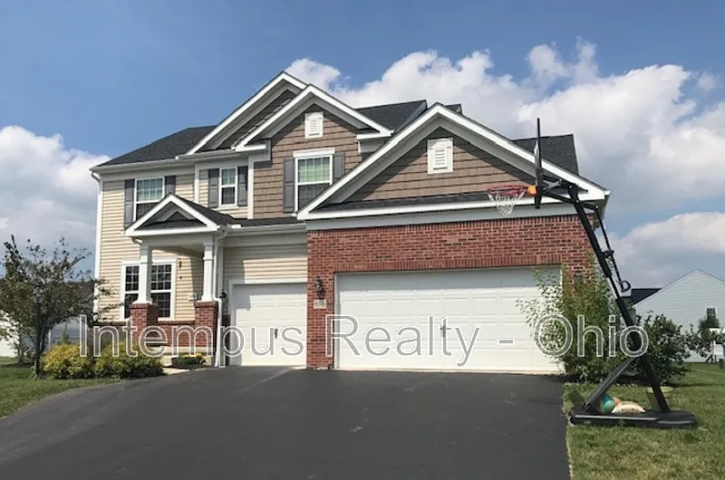 Building Photo - 9390 Woodbine Way