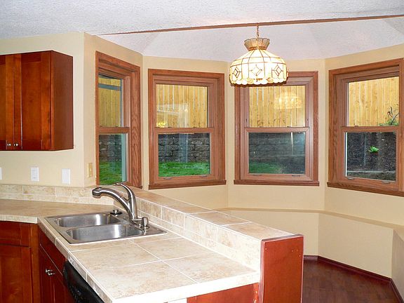 Open floorplan with large kitchen, family room, and eating n