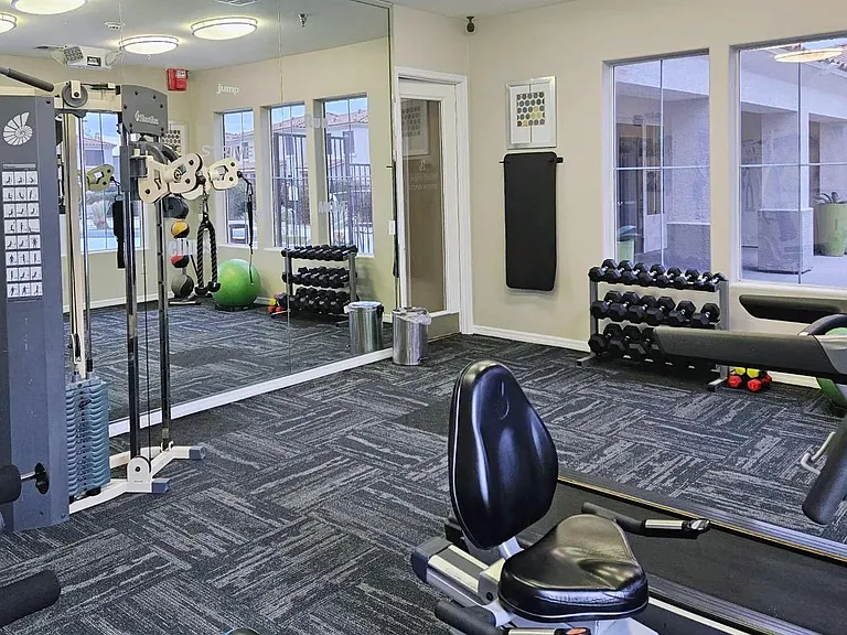 Our community fitness room has everything you needfrom free weights to training ropesto elevate your fitness.