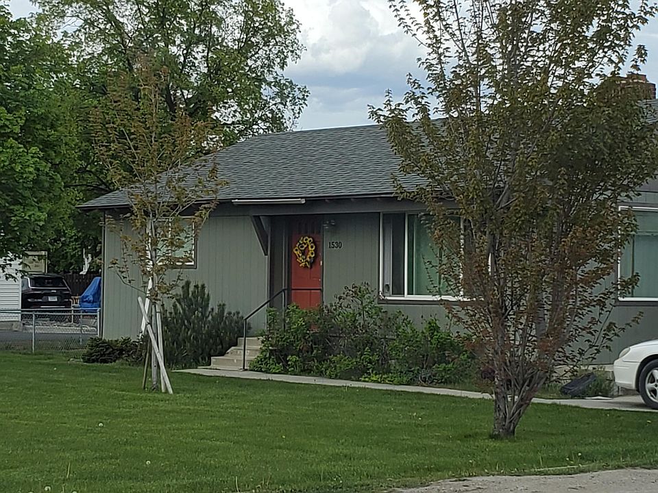 Big front yard, set back from the street. Fenced back yard.