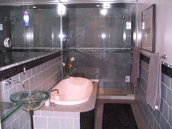 Master bath with large shower and bath tub.  Plenty of space