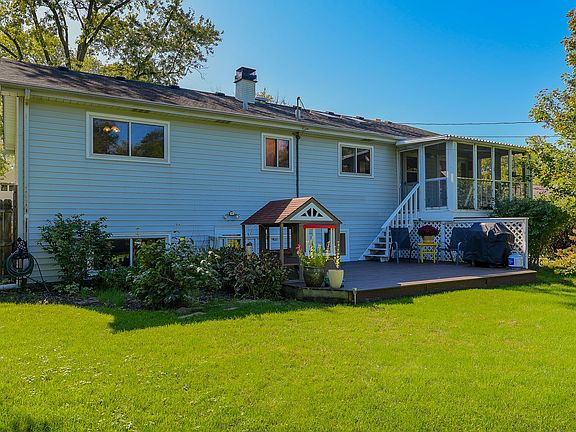 Perfect for entertaining... wood deck and screened in porch.