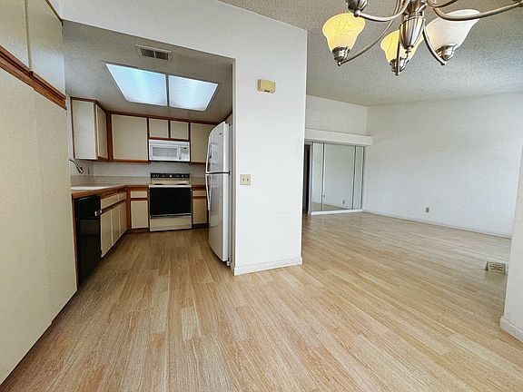 Dinning area to kitchen and living room