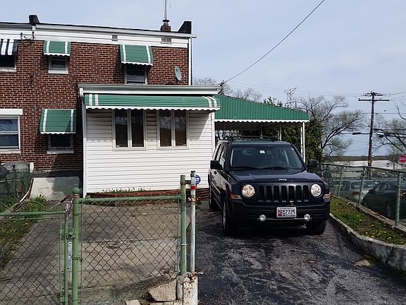 Exterior Back _ Parking Pad and Patio