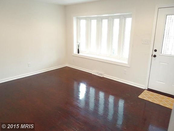 Gleaming Hardwoods Throughout Main Level.