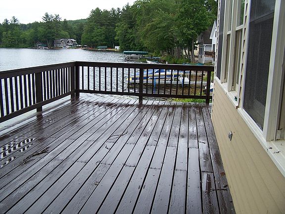 huge wrap around deck overlooking lake