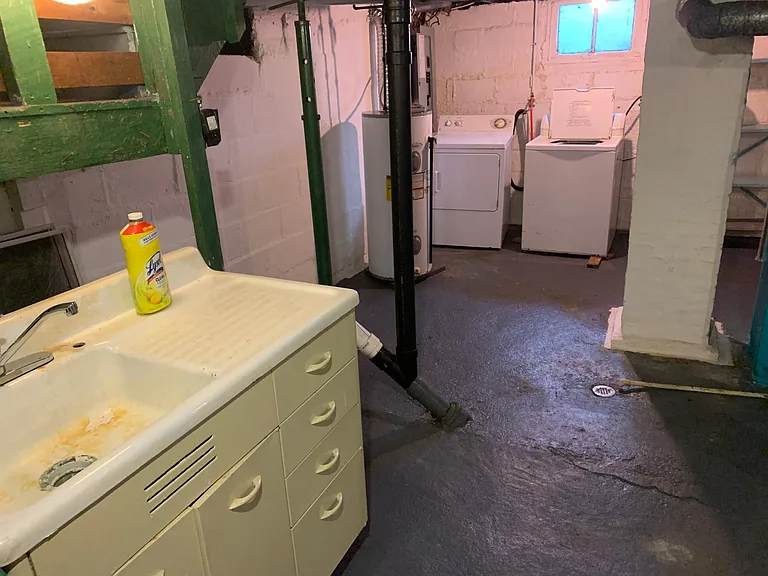 basement washer and dryer. Sink