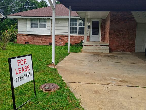 Covered porch and driveway