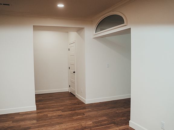 Entry foyer with closet and hallway to private balcony.