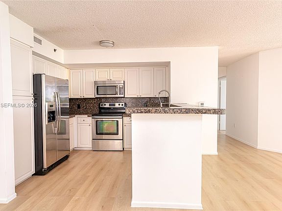 5th image of 19601 E Country Club Dr #7308