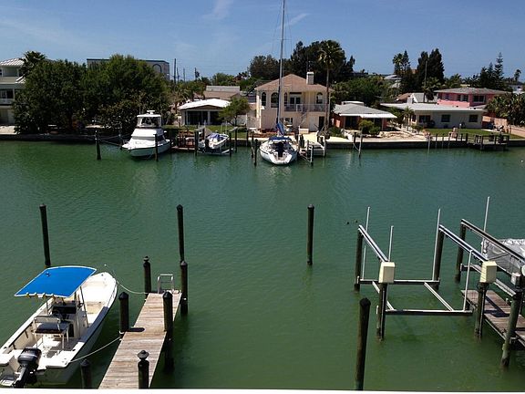 Exterior 2nd Floor Balcony & Boat Lift