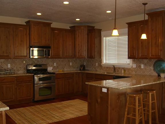 Bright kitchen with plenty of cupboard and counter space