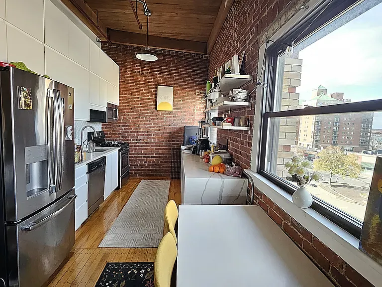 Tons of kitchen storage, full size refrigerator with bottom freezer and ice maker. - 244 Brighton Ave #402