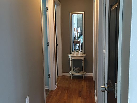 Hallway to bedrooms and bath