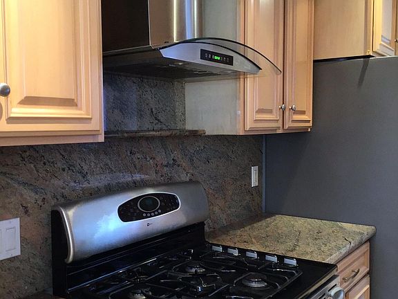 Stainless steel appliances include gas range