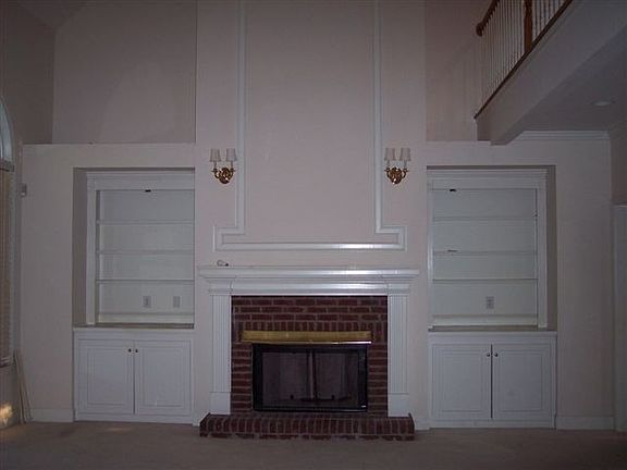 2-story greatroom w/builtins & gas starter fireplace