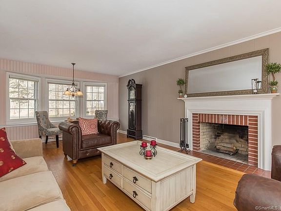 Fireplace creates wonderful focal point in living room.