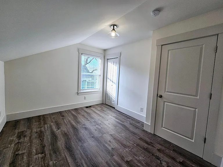 Bedroom 1 with reach-in closet.