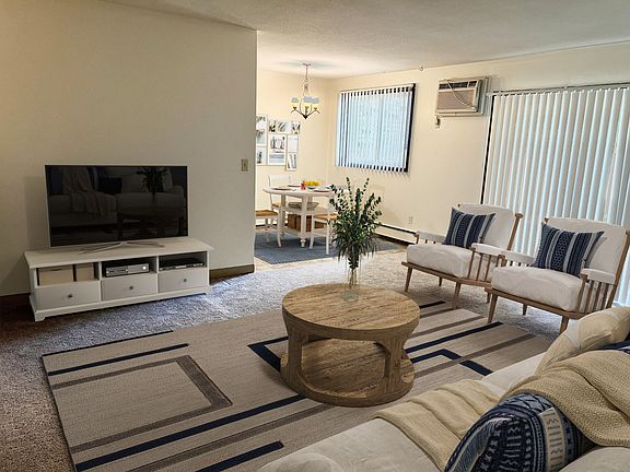 Generously sized living rooms right off of the adorable dining area!