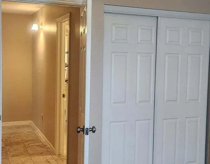 Hallway leads to 2nd bedroom