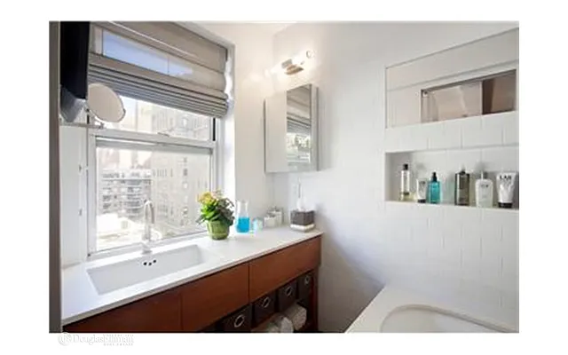 Sold by Douglas Elliman | media 13