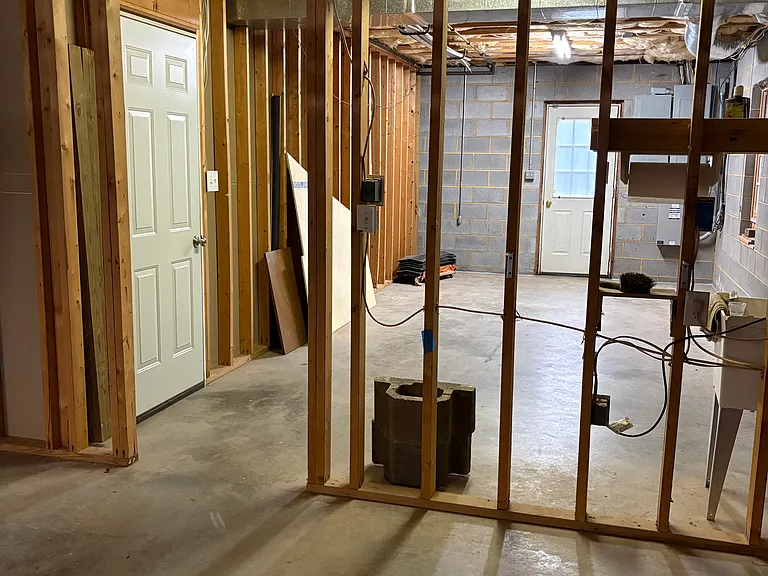 Basement storage - door to back driveway and garage