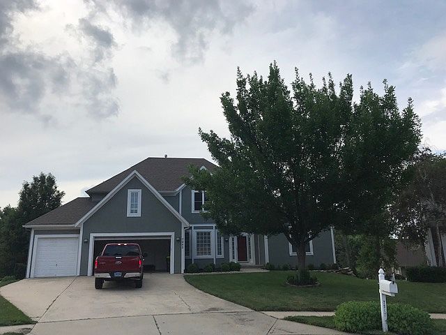It shows three garages. An attic room is above garage. the window near garage on the ground is guest dinner place. The window above guest dinner place is from 1st bed room on the 2nd floor.