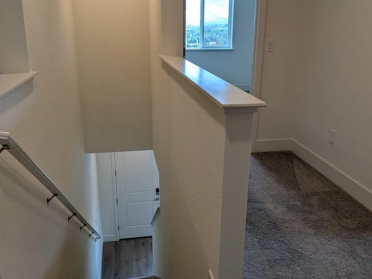 Both smaller upstairs bedrooms with sweeping distant window views