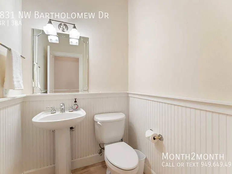 9831 NW Bartholomew Dr — Photo 24
