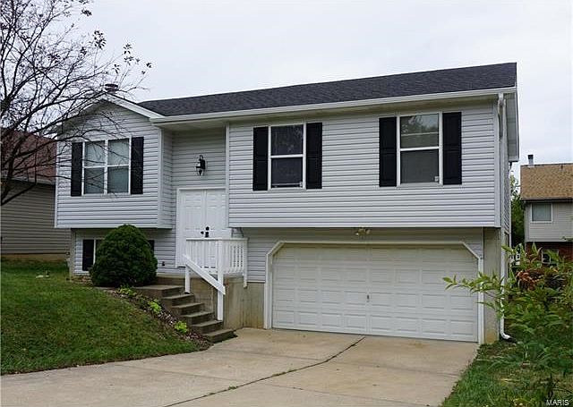 New gray Dutch Lap vinyl siding. New architectural roof, soffets, gutters & shutters.