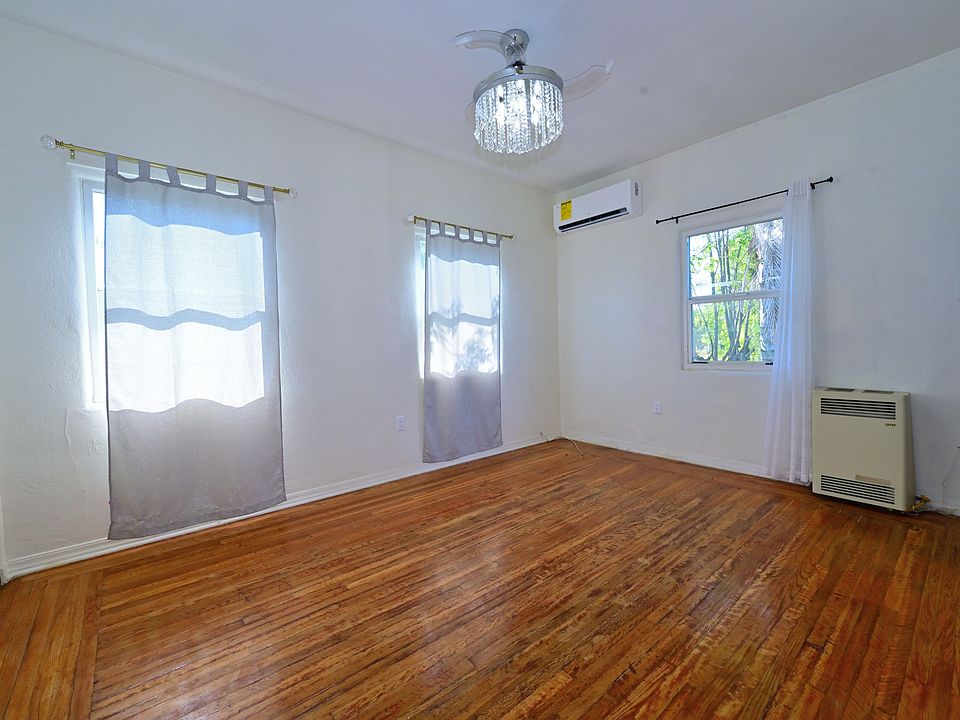 BRIGHT unit with high ceiling + NEW MINI SPLIT A/C, and CRYSTAL ceiling fans in living, and bedroom