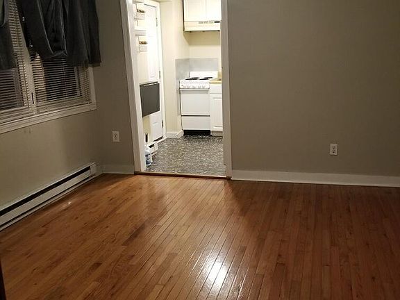 Living room looking into kitchen