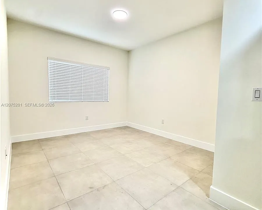 310 E 7th St #203