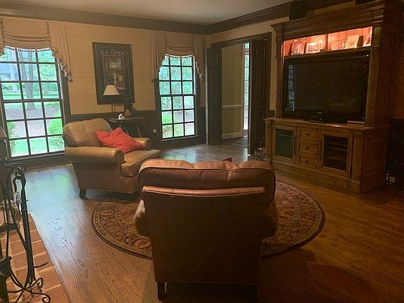 Den with wet bar & fireplace