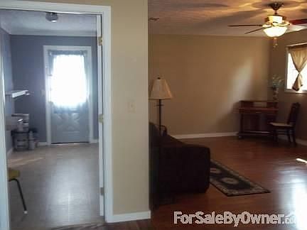 Master bathroom vanities
						:
						The large windows let in sunlight.