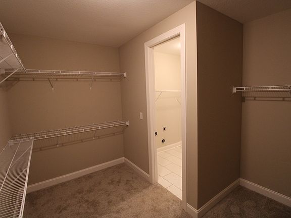 Main Closet Pass Through to Laundry