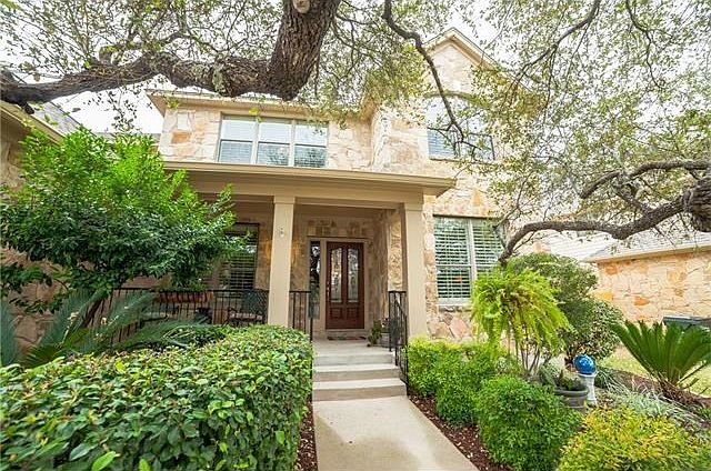 Lovely two-story with amazing curb appeal and professional landscaping!