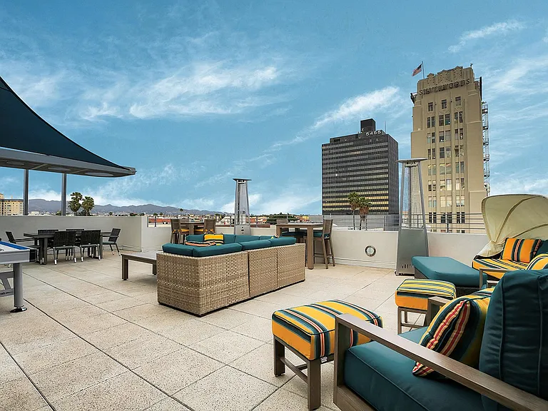 Rooftop lounge with perfect views of LA skyline and Hollywood sign