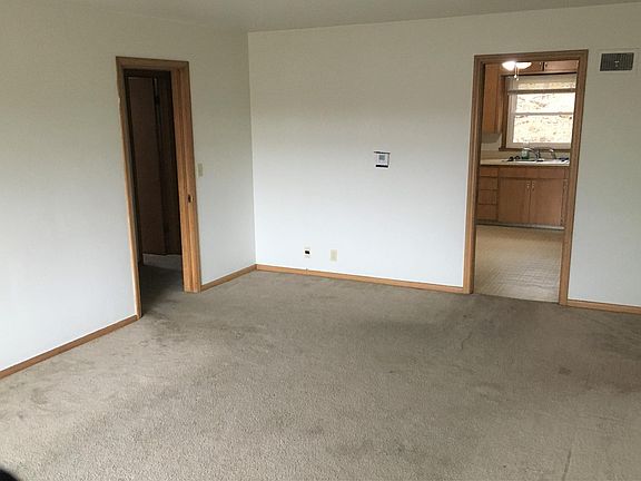 Living and family room. Kitchen entry door.