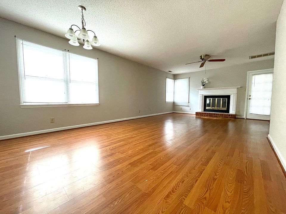 Open dining and living areas.