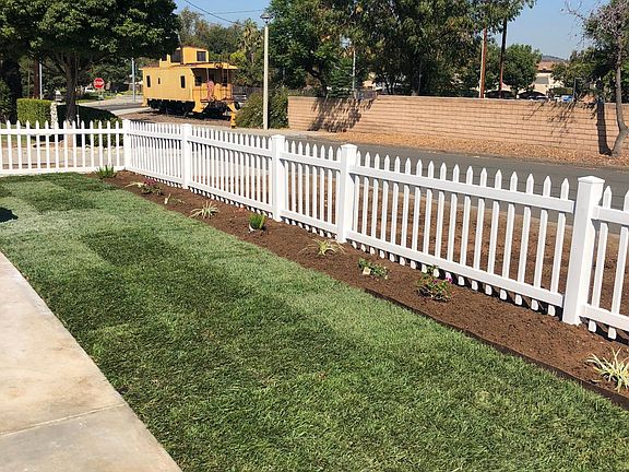 Wide large lush front yard. With fresh new sod.