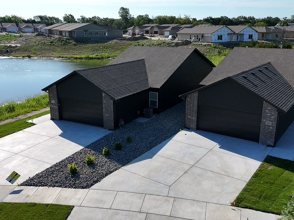 Similar completed property shown. Actual property available is located top center in this photo.