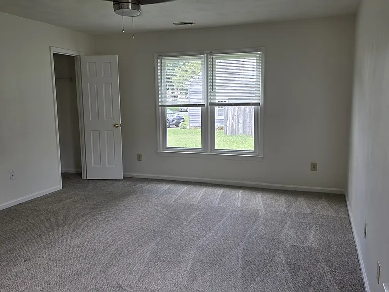 Primary bedroom with closet