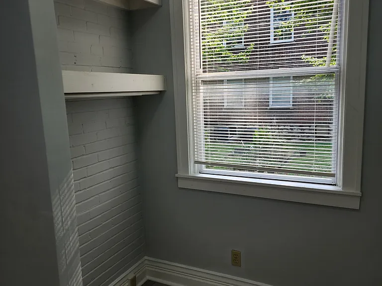Another part of the Sunroom with hanging / storage space.
