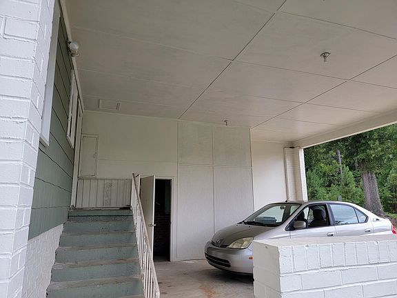 Super large carport can hold 2-3 vehicles!