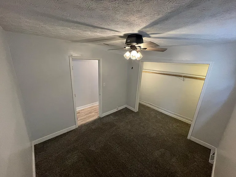 Spare Bedroom/Office with one closet.