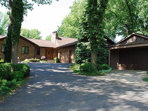 front of brick home