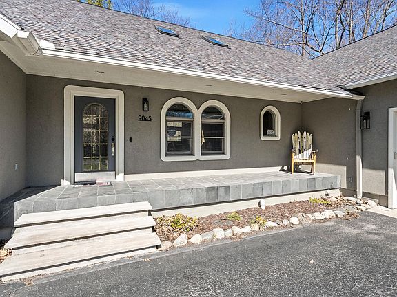 4th image of 9045 N Pointe Woods