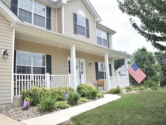 Relax with your coffee, visit with neighbors, watch the kiddos.  All of this from your covered front porch. This home sits nicel
