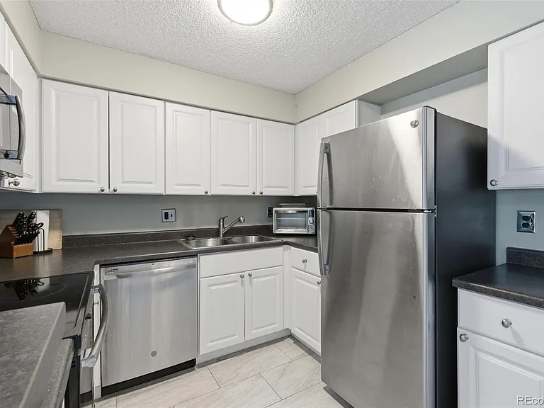 12005 E Harvard Ave #208 — Photo 10